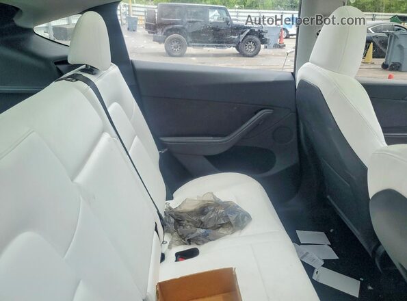 7SAYGDEE7RA227968 2024 TESLA MODEL Gray Հետևի նստատեղերի տեսք