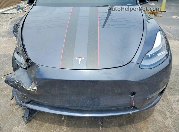 7SAYGDEE7RA227968 2024 TESLA MODEL Gray Սալոնի հետևի տեսք