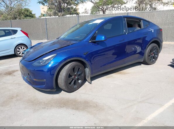 7SAYGDEE7RF031306 2024 TESLA MODEL Y Blue Առջևի ձախ երեք քառորդ տեսարան