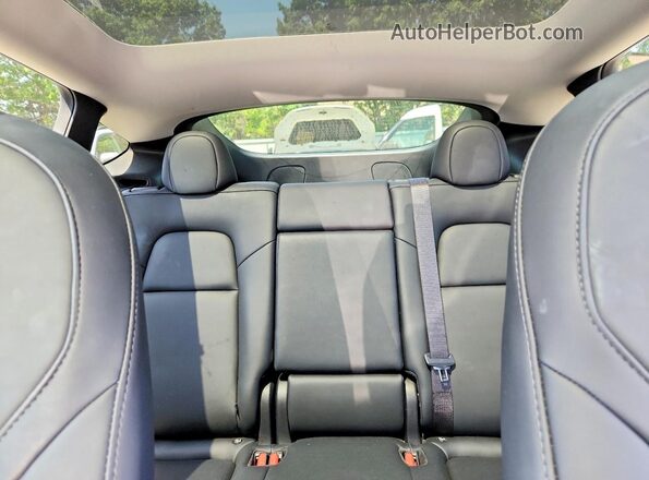 7SAYGDEE7SA354886 2025 TESLA MODEL Black Հետևի նստատեղերի տեսք