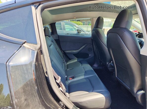 7SAYGDEE7SA354886 2025 TESLA MODEL Black Սալոնի հետևի տեսք