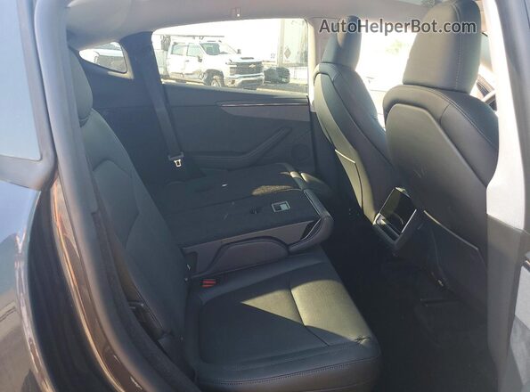 7SAYGDEE7TA625706 2026 TESLA MODEL Gray Vista de los asientos traseros