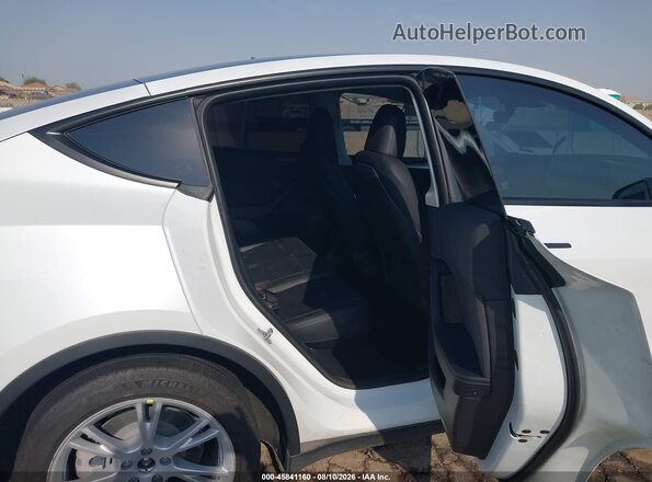 7SAYGDEE8NA012531 2022 TESLA MODEL Y White VIN კოდის სტიკერის ხედი