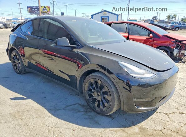 7SAYGDEE8NF410454 2022 TESLA MODEL Черный Передняя правая четверть