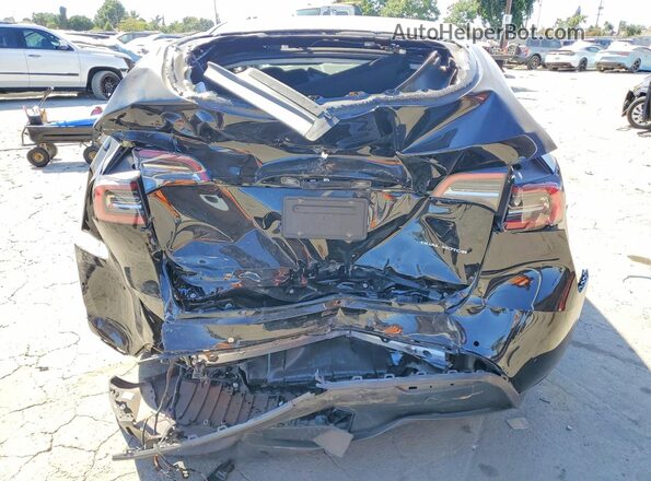 7SAYGDEE8NF410454 2022 TESLA MODEL Черный Вид сзади