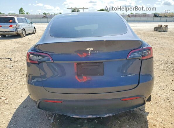 7SAYGDEE8PF703645 2023 TESLA MODEL Gray Vista trasera