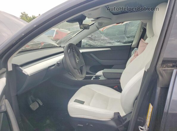 7SAYGDEE8PF783884 2023 TESLA MODEL Серый Вид салона спереди
