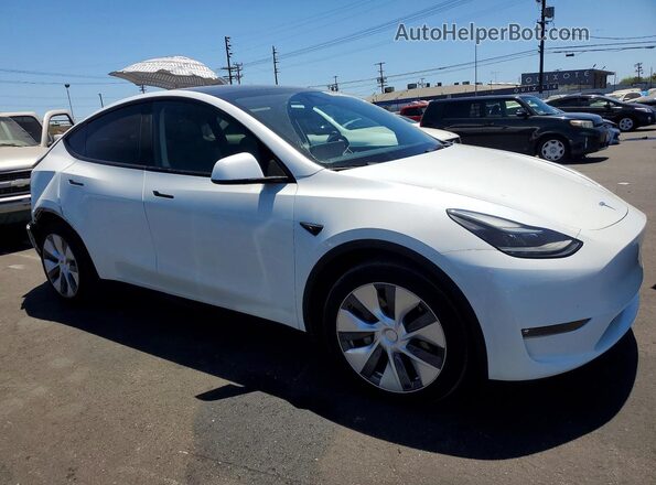 7SAYGDEE8PF857899 2023 TESLA MODEL White Front right