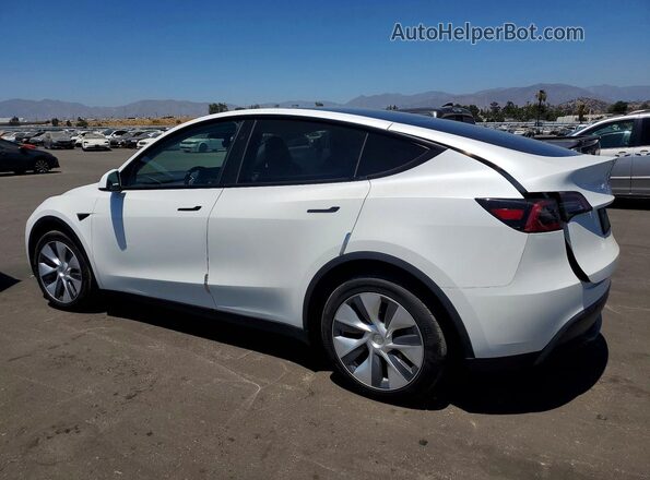 7SAYGDEE8PF857899 2023 TESLA MODEL White Rear left