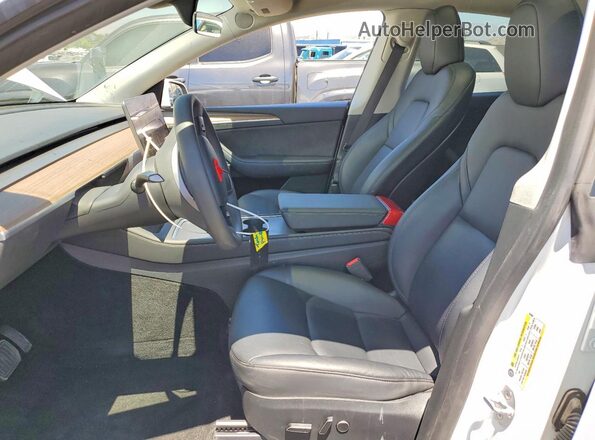 7SAYGDEE8PF857899 2023 TESLA MODEL White Front interior view