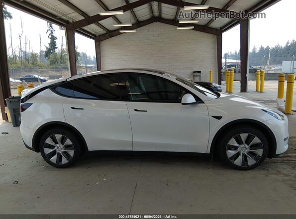 7SAYGDEE8PF886805 2023 TESLA MODEL Y White Vista interior trasera