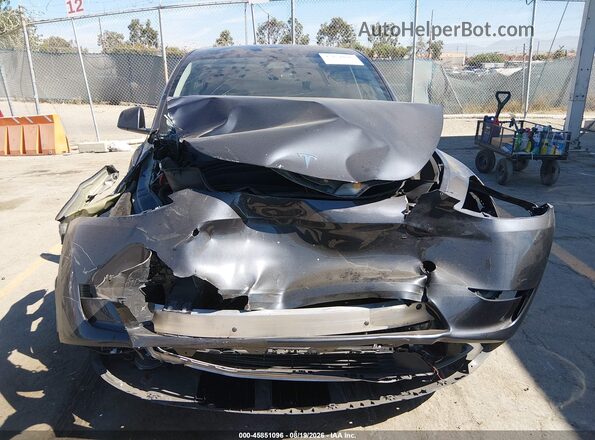 7SAYGDEE8RA237067 2024 TESLA MODEL Y Gray Սալոնի հետևի տեսք