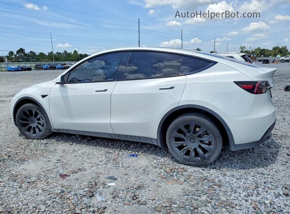 7SAYGDEE8RA240261 2024 TESLA MODEL White Rear left