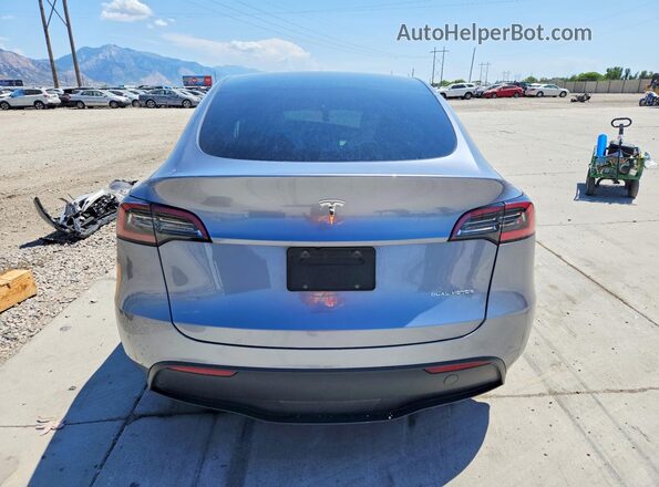 7SAYGDEE8RA301799 2024 TESLA MODEL Silver Вид ззаду