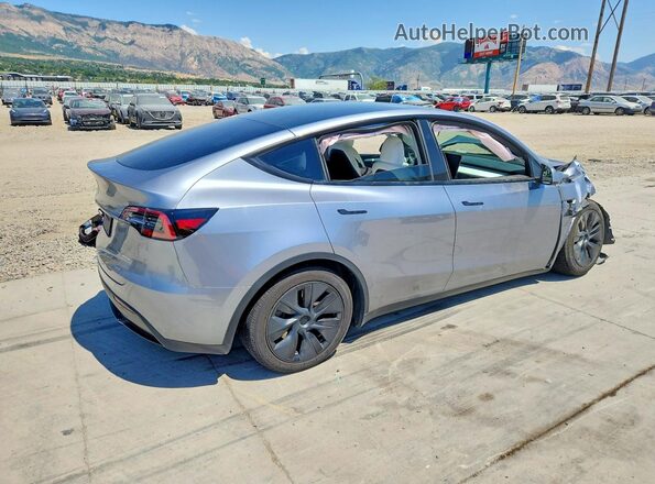 7SAYGDEE8RA301799 2024 TESLA MODEL Silver Задня права чверть