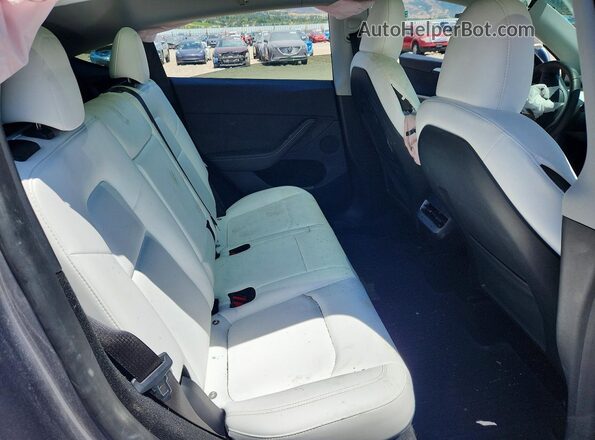 7SAYGDEE8RA301799 2024 TESLA MODEL Silver Вид задніх сидінь