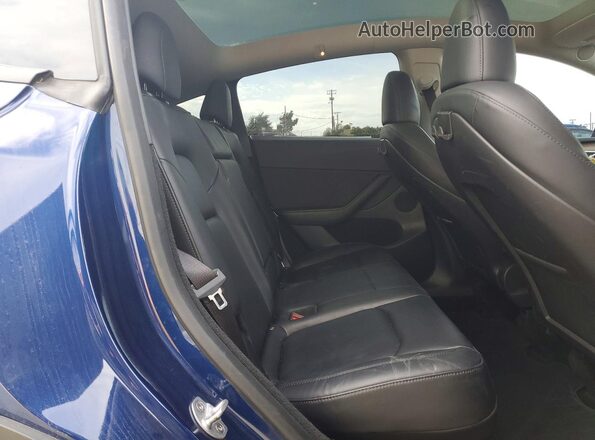 7SAYGDEE8RF985661 2024 TESLA MODEL Blue Հետևի նստատեղերի տեսք