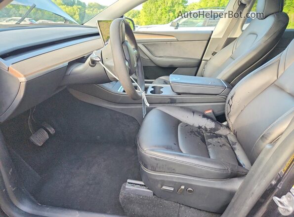 7SAYGDEE8RF988821 2024 TESLA MODEL Charcoal Vista interior delantera