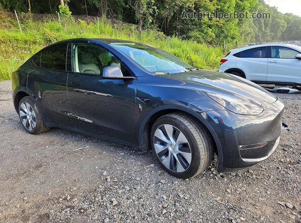 7SAYGDEE8RF988821 2024 TESLA MODEL Charcoal Delantero derecho