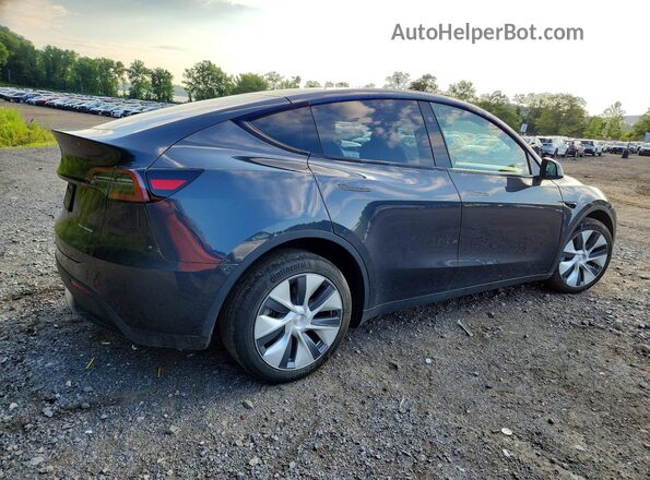 7SAYGDEE8RF988821 2024 TESLA MODEL Charcoal Trasero derecho