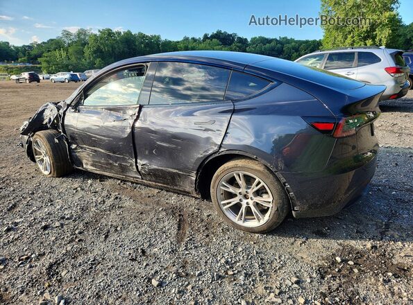 7SAYGDEE8RF988821 2024 TESLA MODEL Charcoal Trasero izquierdo