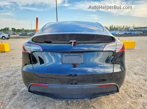 7SAYGDEE8SA362351 2025 TESLA MODEL Black Հետևի տեսք
