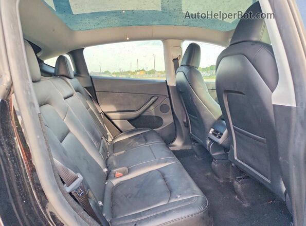 7SAYGDEE8SA362351 2025 TESLA MODEL Black Հետևի նստատեղերի տեսք