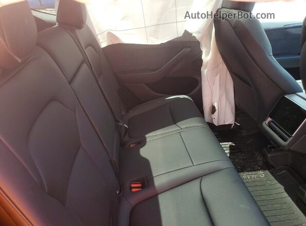 7SAYGDEE8TA452729 2026 TESLA MODEL Charcoal Սալոնի հետևի տեսք