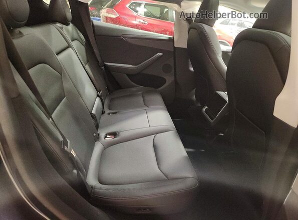 7SAYGDEE8TA619347 2026 TESLA MODEL Gray Vista interior trasera