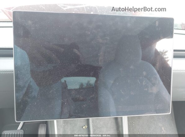 7SAYGDEE8TF652318 2026 TESLA MODEL Y Red Rear seats view