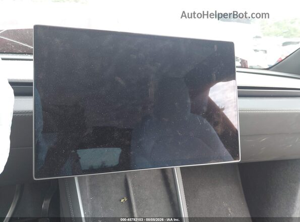 7SAYGDEE8TF652318 2026 TESLA MODEL Y Red 360 interior view