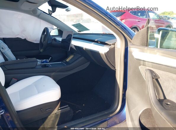 7SAYGDEE9NF515813 2022 TESLA MODEL Y Blue Вид салону спереду