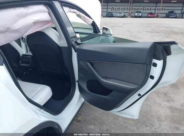 7SAYGDEE9NF535737 2022 TESLA MODEL Y White VIN կոդի պիտակի տեսք