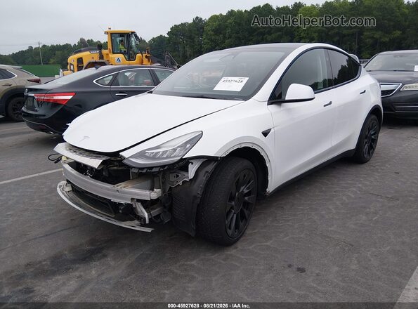 7SAYGDEE9PA137184 2023 TESLA MODEL Y White Vista tres cuartos delantera izquierda