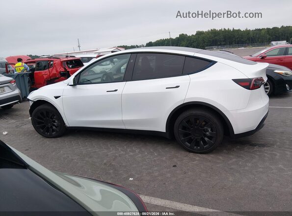 7SAYGDEE9PA137184 2023 TESLA MODEL Y White Vista interior trasera