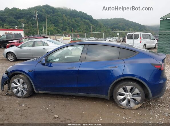 7SAYGDEE9PA170976 2023 TESLA MODEL Y Blue Вид задньої частини салону
