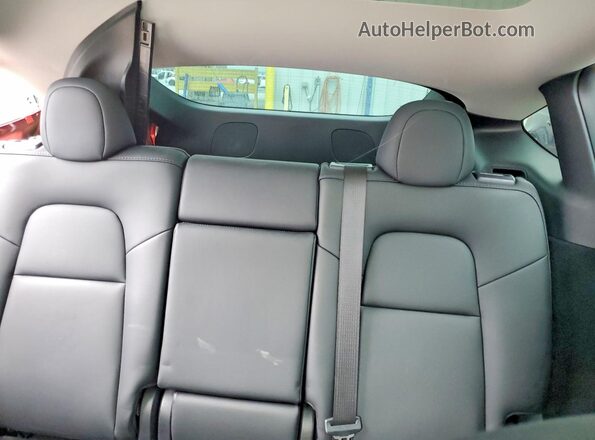 7SAYGDEE9PA177460 2023 TESLA MODEL Red უკანა სავარძლების ხედი