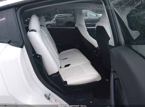 7SAYGDEE9PF855580 2023 TESLA MODEL Y Gray VIN կոդի պիտակի տեսք
