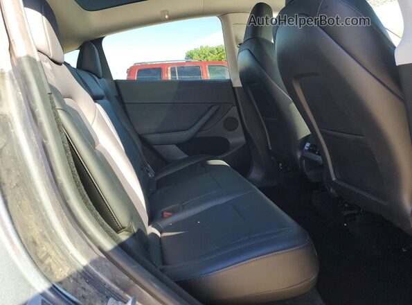 7SAYGDEE9PF877515 2023 TESLA MODEL Charcoal Vista de los asientos traseros