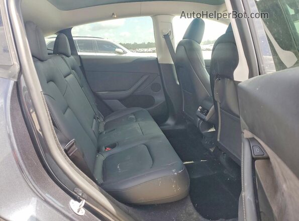 7SAYGDEE9RA234291 2024 TESLA MODEL Серый Вид задней части салона