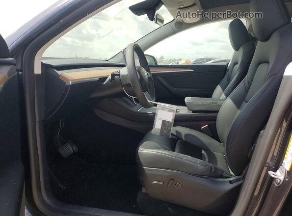 7SAYGDEE9RA234291 2024 TESLA MODEL Серый Вид салона спереди