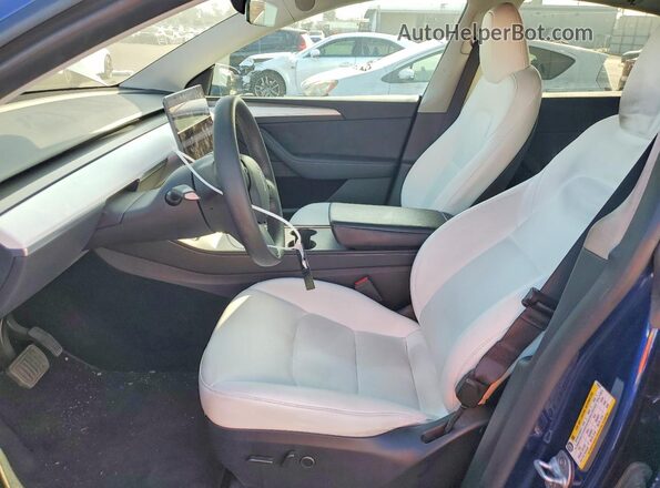 7SAYGDEE9RF064257 2024 TESLA MODEL Blue Front interior view