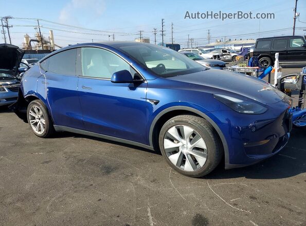 7SAYGDEE9RF064257 2024 TESLA MODEL Blue Front right