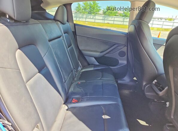 7SAYGDEE9RF169588 2024 TESLA MODEL White Widok tylnych siedzeń