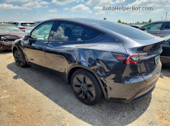 7SAYGDEE9RF199173 2024 TESLA MODEL Charcoal Rear left