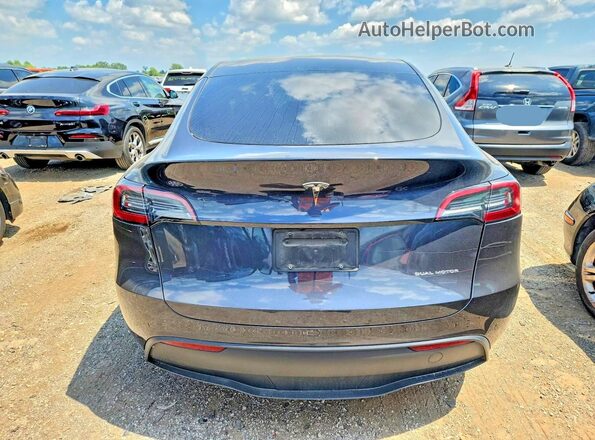 7SAYGDEE9RF199173 2024 TESLA MODEL Charcoal Rear view