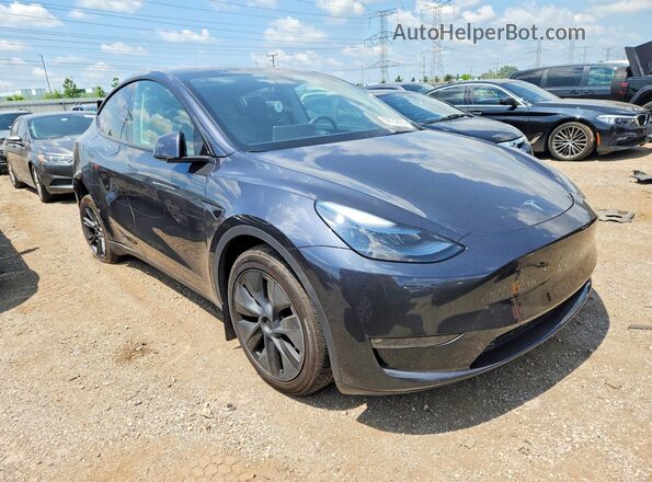 7SAYGDEE9RF199173 2024 TESLA MODEL Charcoal Front right