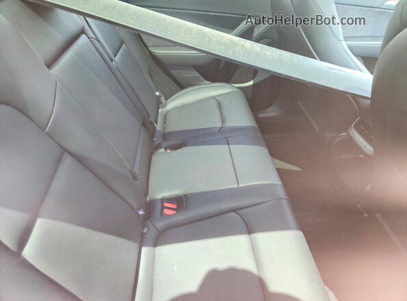 7SAYGDEE9RF199173 2024 TESLA MODEL Charcoal Rear seats view