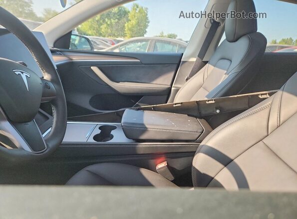 7SAYGDEE9RF199173 2024 TESLA MODEL Charcoal Front interior view
