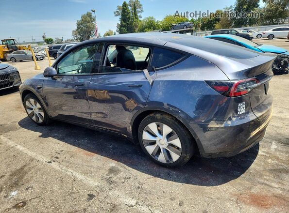 7SAYGDEEXPF909985 2023 TESLA MODEL Gray Tył lewy
